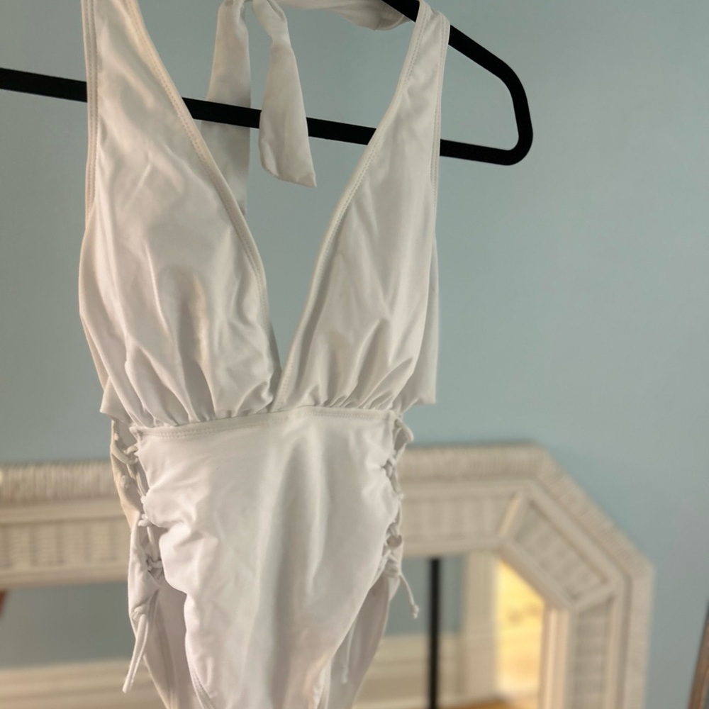 white and red one peice swimsuits